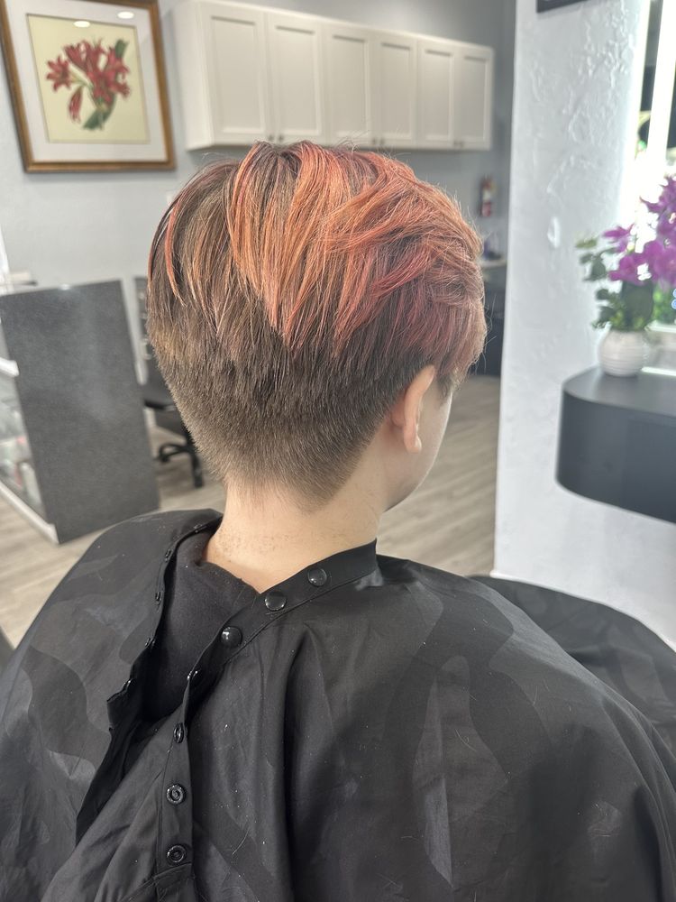 Short pixie with rose-copper highlights